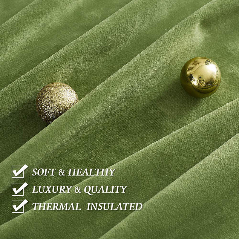 Luxurious green velvet blackout curtain fabric detail, showcasing soft texture, thermal insulation, and premium quality with golden accents.