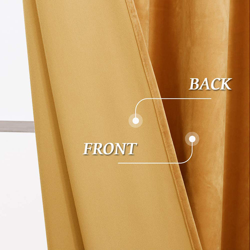 Close-up of a golden velvet blackout curtain panel, showing the smooth front and the textured, noise-reducing back lining.