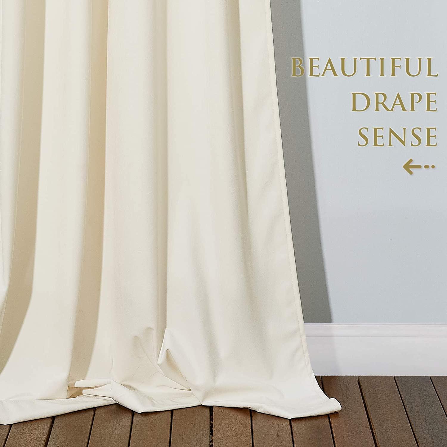 Cream luxury velvet blackout curtain with soft, noise-reducing fabric & elegant drape on wood floor.