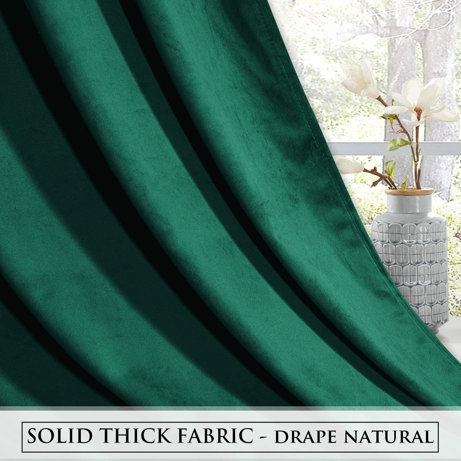 Close-up of luxurious deep green velvet blackout curtain, showcasing its thick fabric and elegant natural drape.