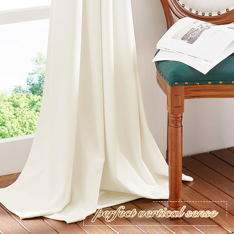 Cream rod pocket velvet blackout curtain panel with elegant vertical drape, perfect for living room & bedroom privacy.
