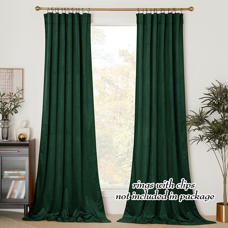 Long dark green velvet rod pocket blackout curtains, 2 panels, offering privacy protection for living room or bedroom.