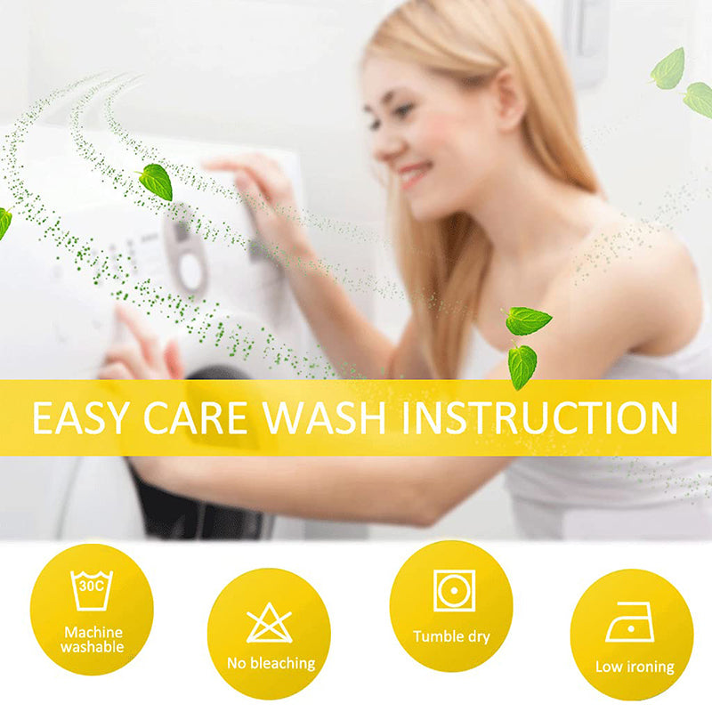 Woman loading laundry into machine. Easy care wash instructions for KGORGE velvet blackout curtains: machine washable, no bleach, tumble dry, low iron.