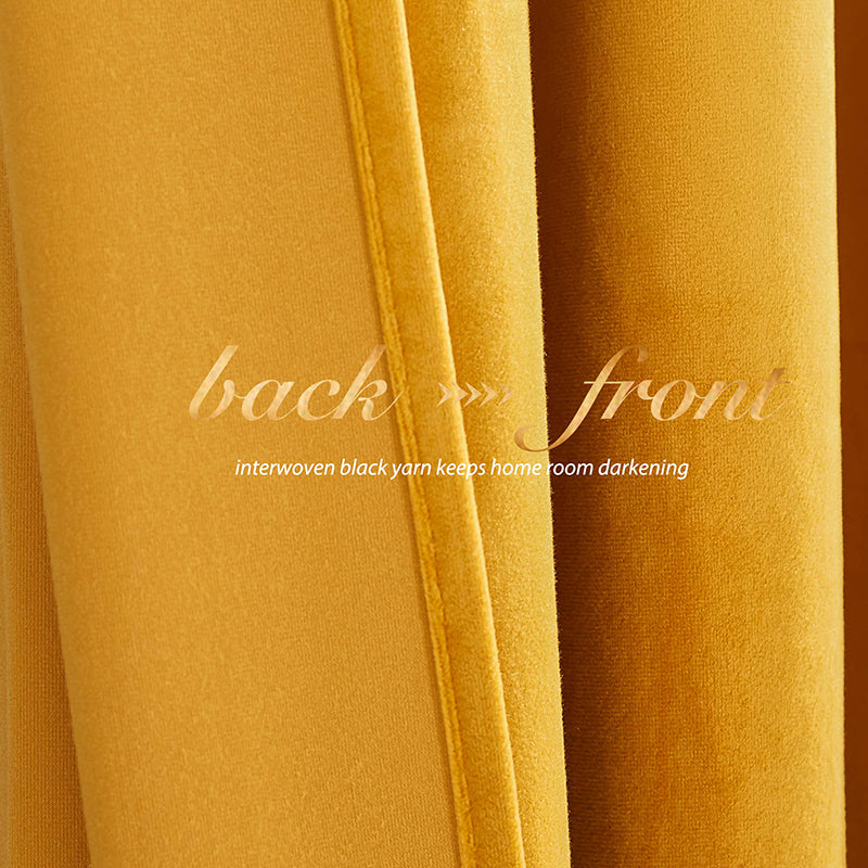 Close-up of gold velvet rod pocket blackout curtain fabric, revealing interwoven black yarn for superior room darkening and privacy.