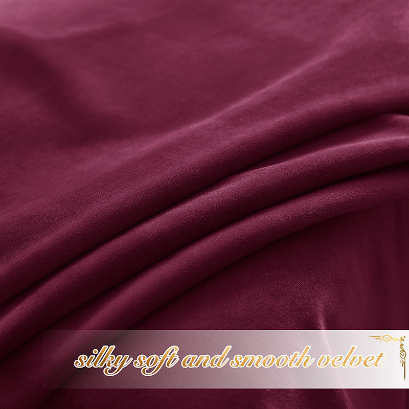 Close-up of luxurious deep burgundy velvet blackout curtain fabric, highlighting its silky soft and smooth texture for privacy.