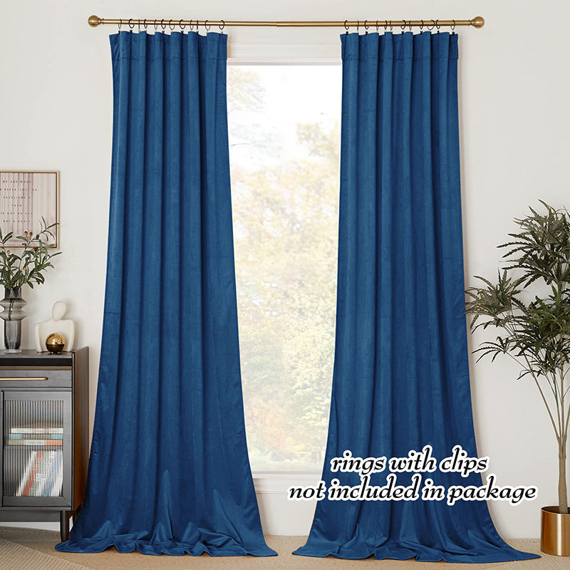 Two deep blue velvet rod pocket blackout curtain panels for living room or bedroom, providing privacy & light blocking.