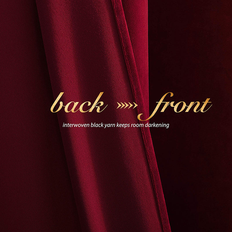 Close-up of rich burgundy velvet blackout curtain fabric, showing its interwoven black yarn for room darkening and privacy.