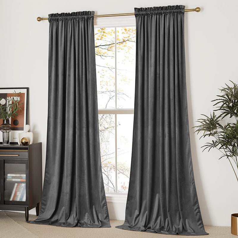 Two dark grey velvet rod pocket blackout curtains for living room or bedroom windows, enhancing privacy and light blocking.