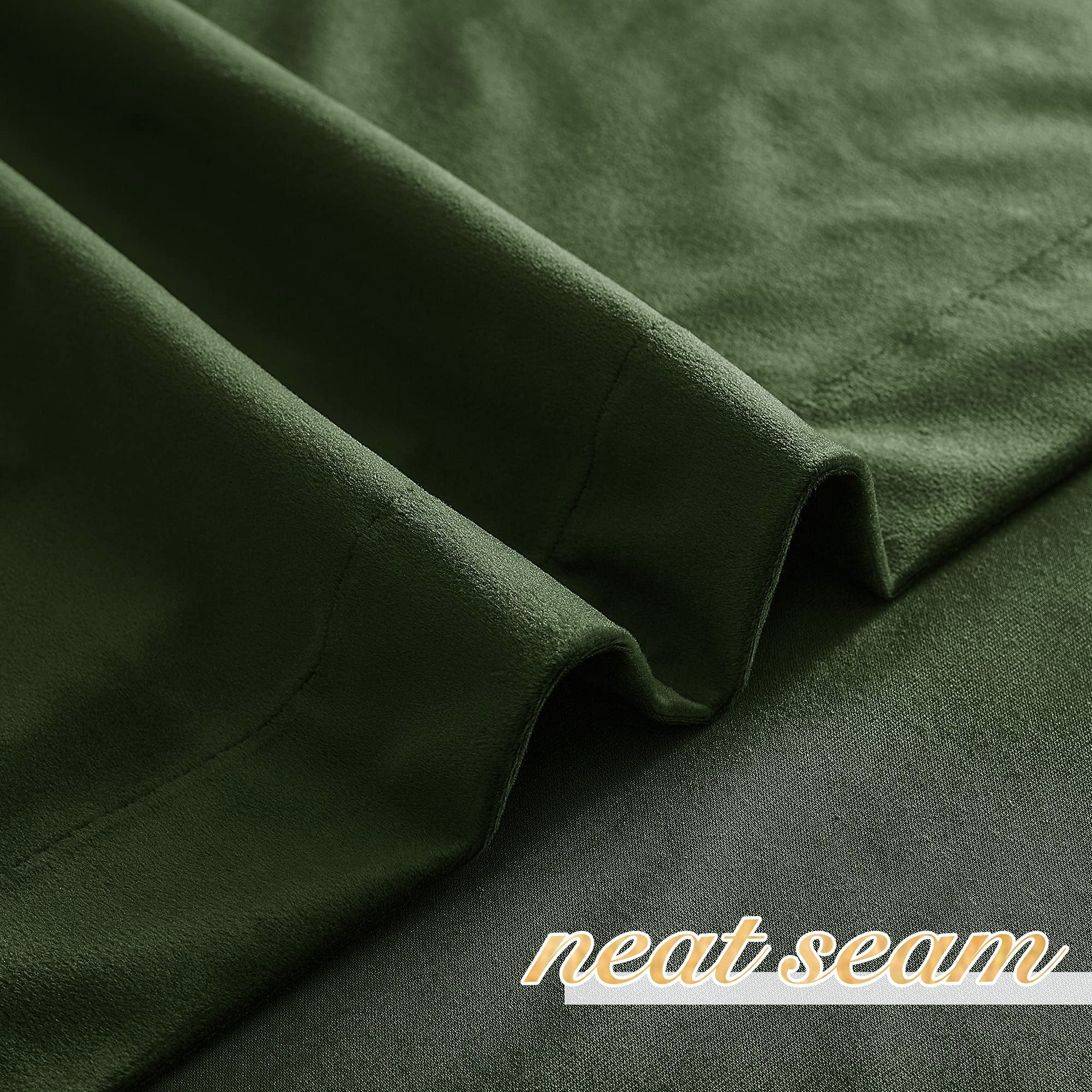 Close-up of dark green velvet rod pocket blackout curtain, highlighting soft texture and a neat seam for privacy.