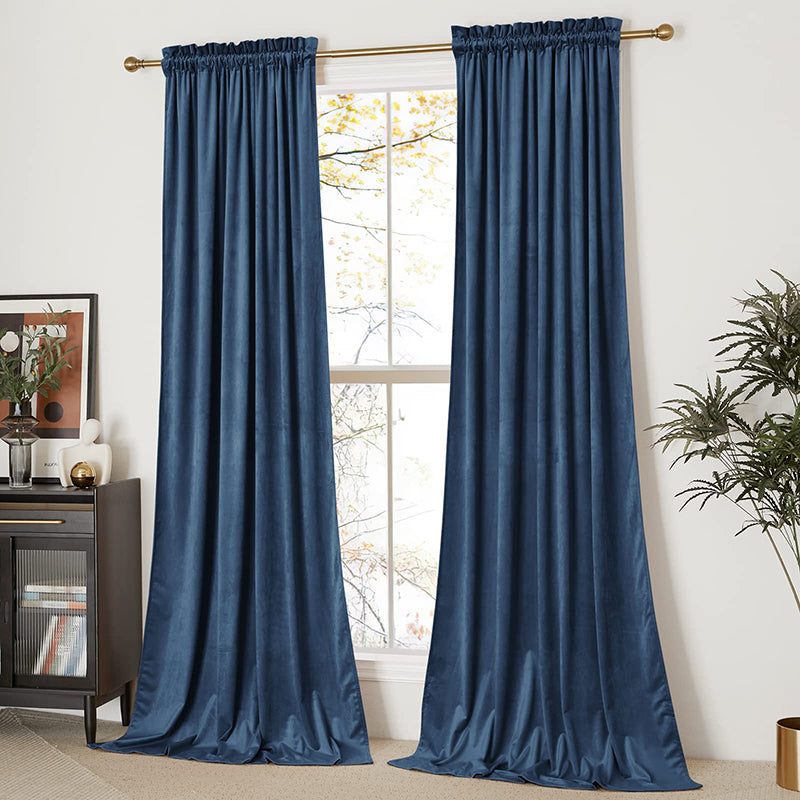 Rod pocket dark blue velvet blackout curtains, 2 panels, providing privacy for a living room or bedroom window.