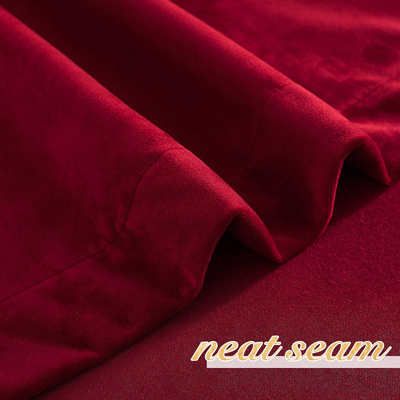Deep red velvet rod pocket blackout curtain detail, showing the neat seam and rich fabric texture for privacy in living rooms & bedrooms.