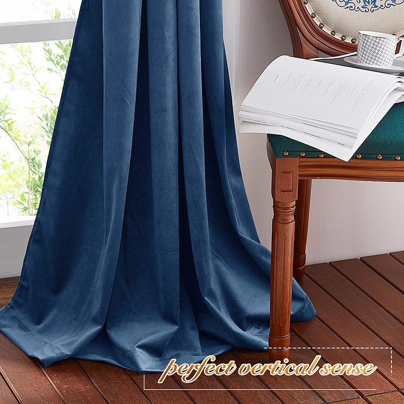 Plush dark blue velvet rod pocket blackout curtain panel, offering privacy and light blocking, elegantly draped for living room or bedroom.