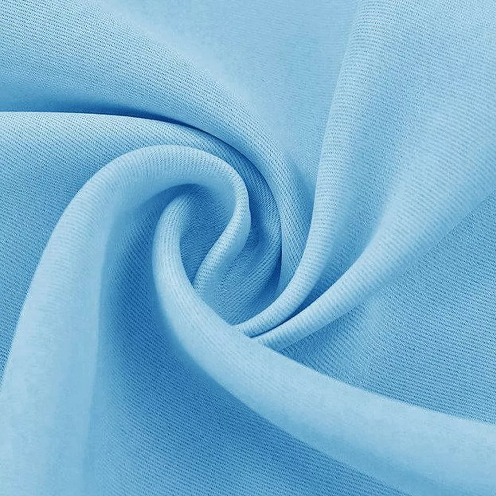 Close-up of light blue 4-layer blackout curtain fabric, showing its dense, soft texture ideal for soundproof and anti-dust features.