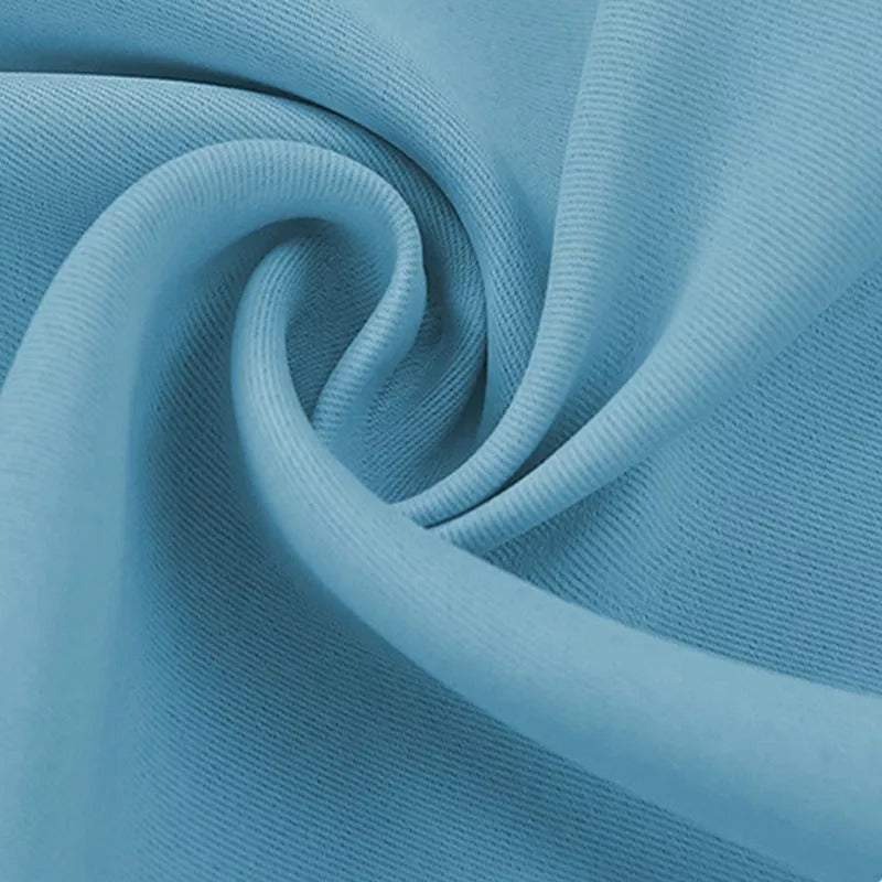 Light blue textured 4-layer fabric detail, highlighting its dense weave for soundproof blackout curtains.