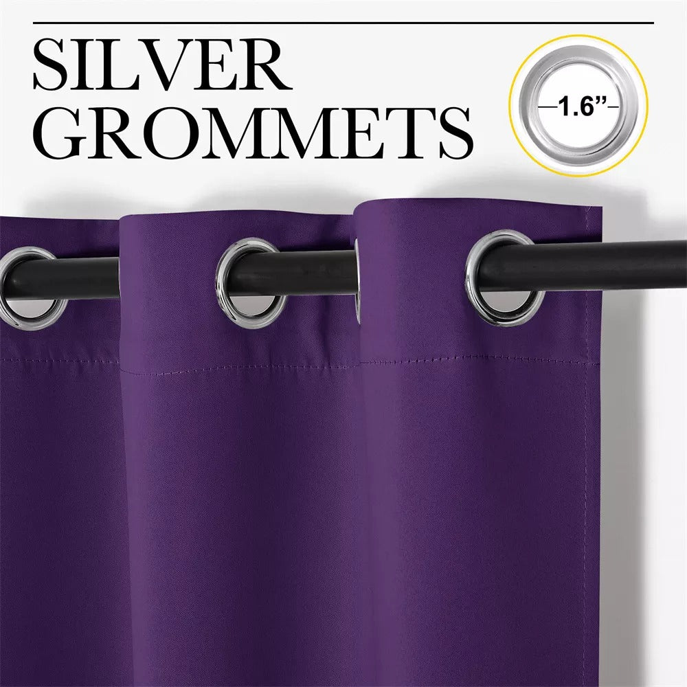 Close-up of a vibrant deep purple blackout curtain with prominent 1.6-inch silver grommets, ideal for living room or bedroom.