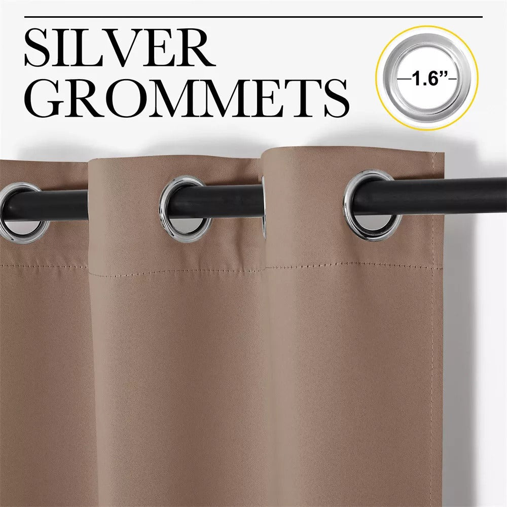 Close-up of beige 4-layer soundproof blackout curtain panel with 1.6-inch silver grommets, hanging on a rod.