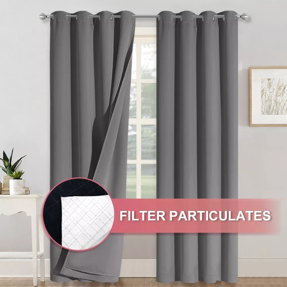 Gray 4-layer silver grommet blackout curtains, one panel revealing inner particle filter fabric for soundproofing and thermal insulation.