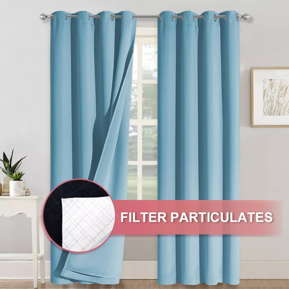 Blue 4-layer blackout curtains with silver grommets, revealing anti-dust soundproof fabric that filters particulates. Ideal for living room or bedroom.