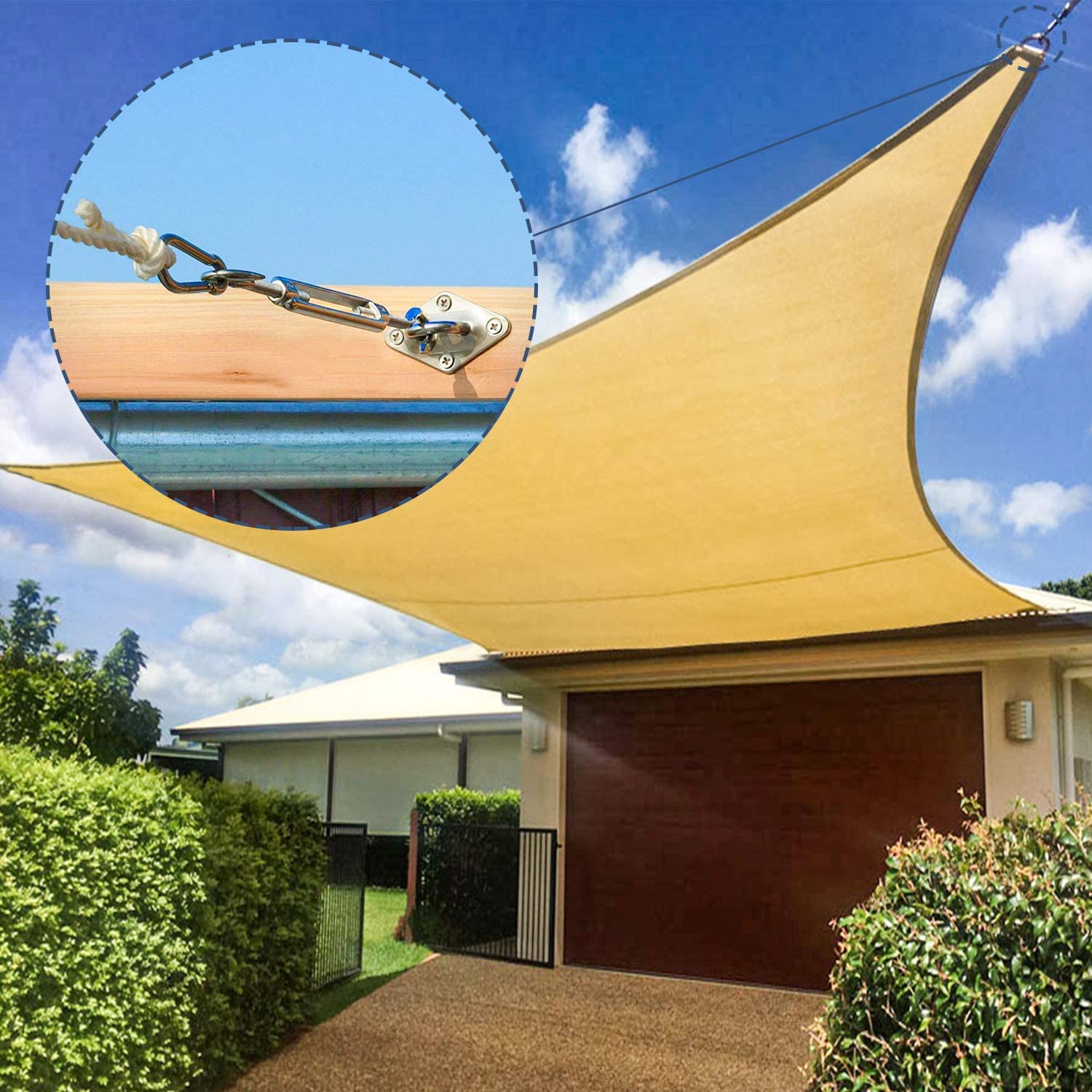 Close-up of 304 stainless steel hardware kit with turnbuckle and pad eye securing a beige sun shade sail for outdoor installation.