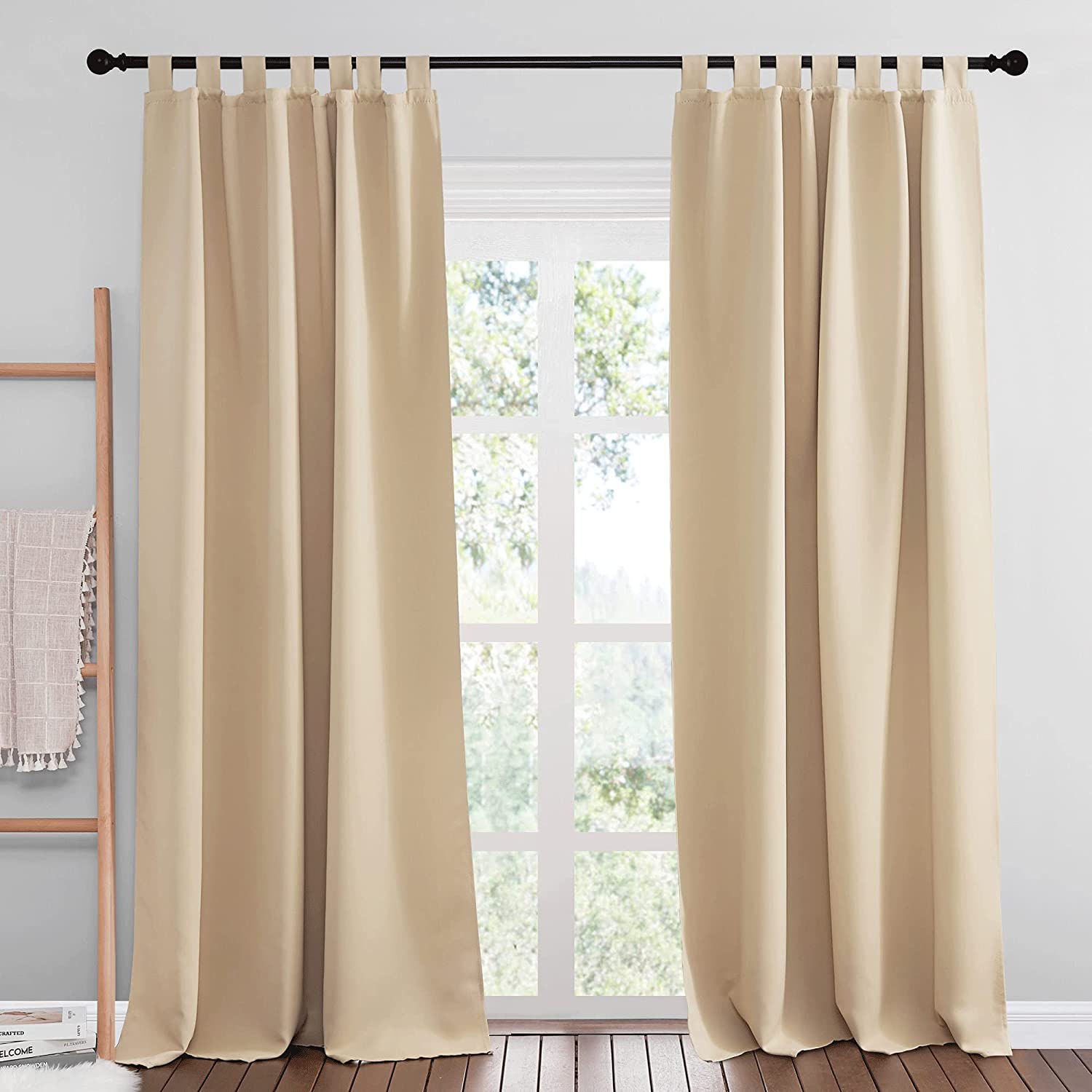 Pair of smooth beige tab top thermal insulated blackout curtains, offering room darkening and privacy protection for living room/bedroom.
