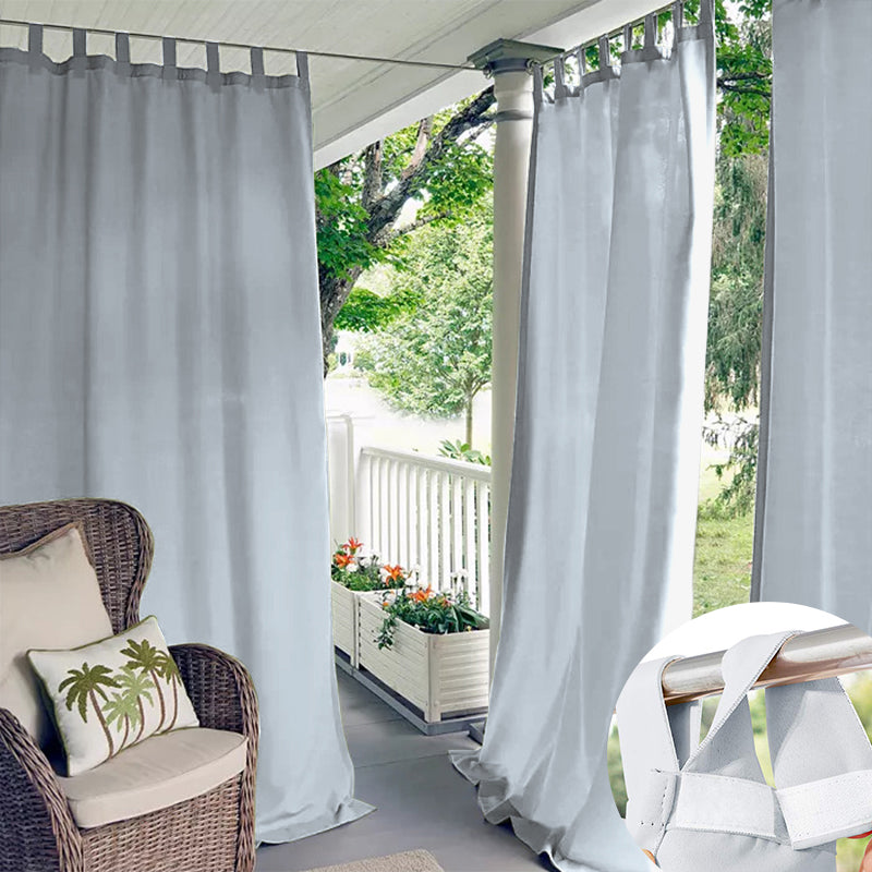 Light gray Velcro tab top waterproof outdoor curtains providing privacy on a patio, with an inset showing the secure fastening.