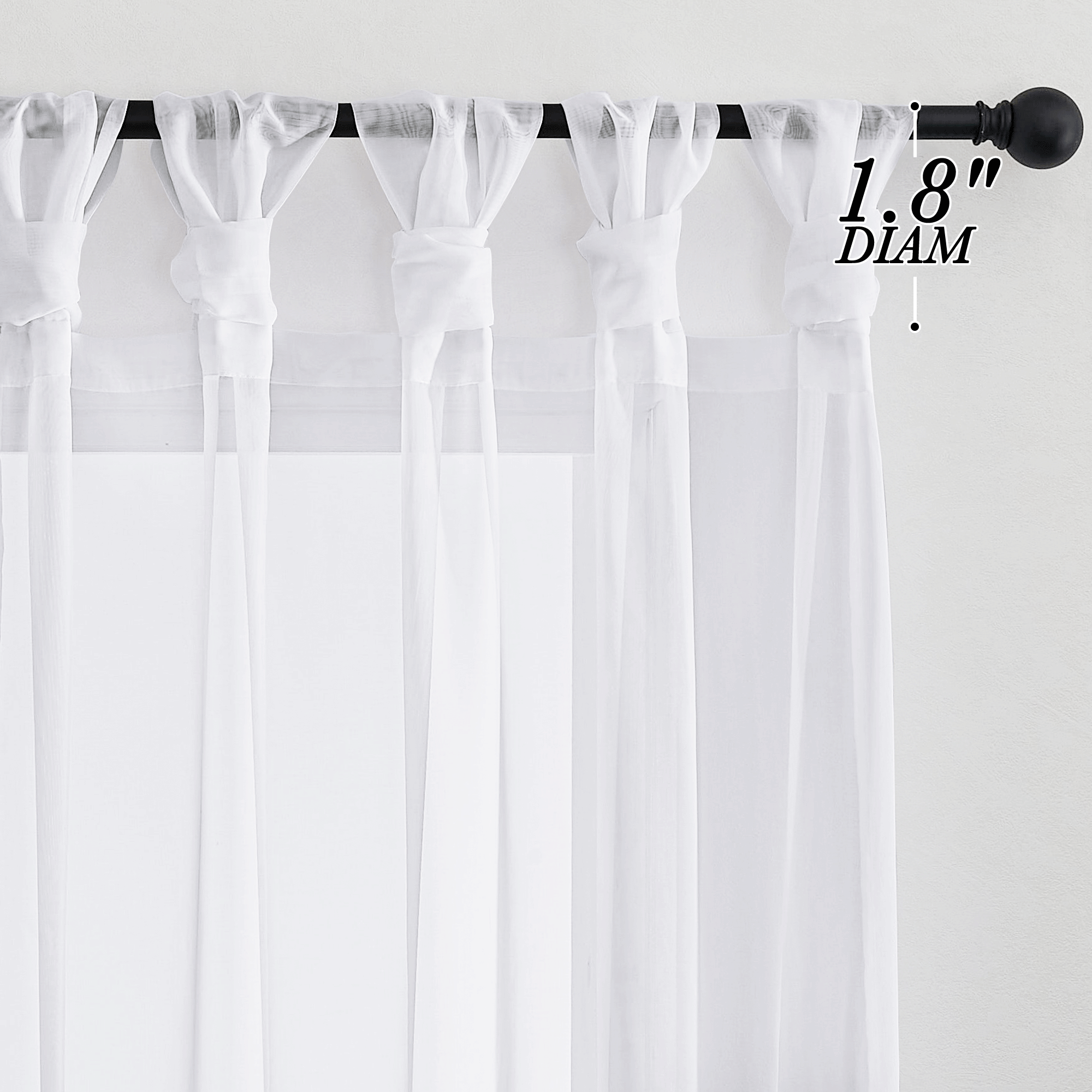 White voile sheer privacy curtains with twist tab top hanging from a black rod, highlighting the 1.8 inch diameter finial.