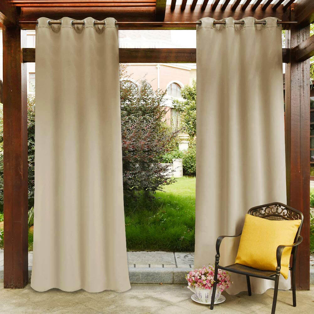 Beige KGORGE waterproof grommet top patio outdoor curtains offering privacy and shade under a wooden pergola.