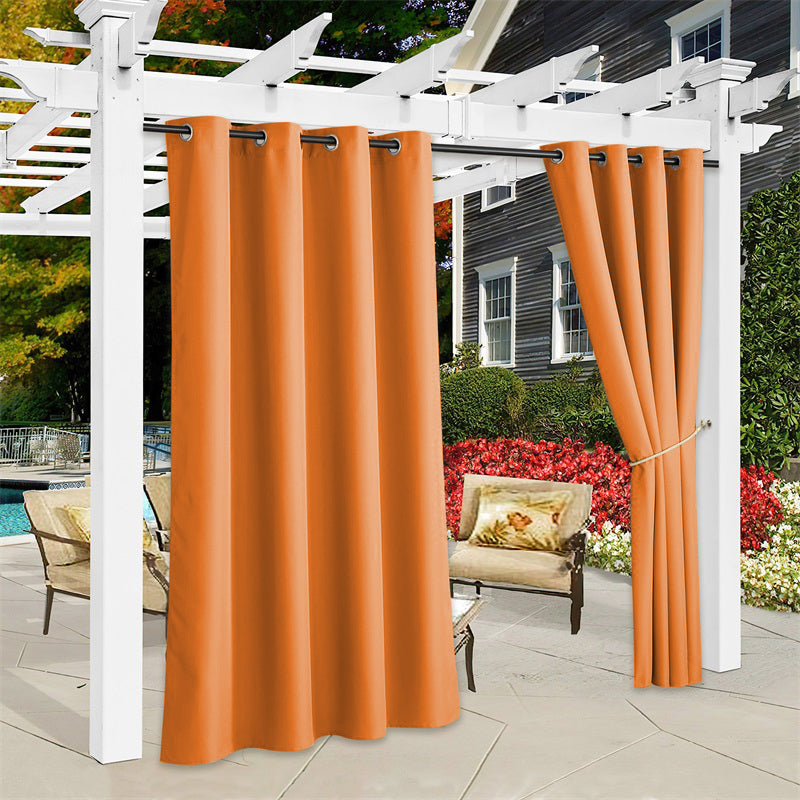 Orange waterproof outdoor canvas curtains hanging on a white pergola, with one panel tied back, enhancing a sunny patio with a pool.